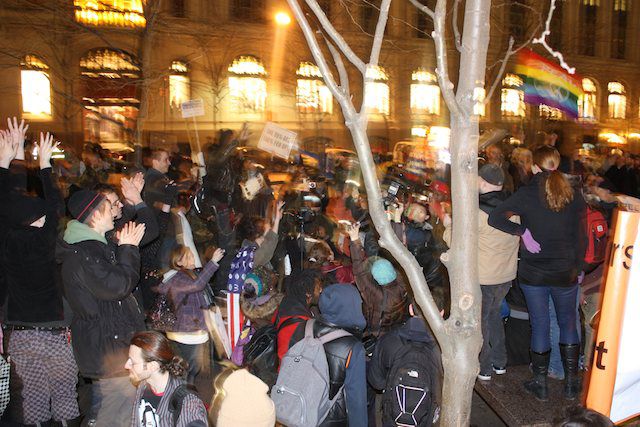 Protesters celebrate returning to Zuccotti Park. 